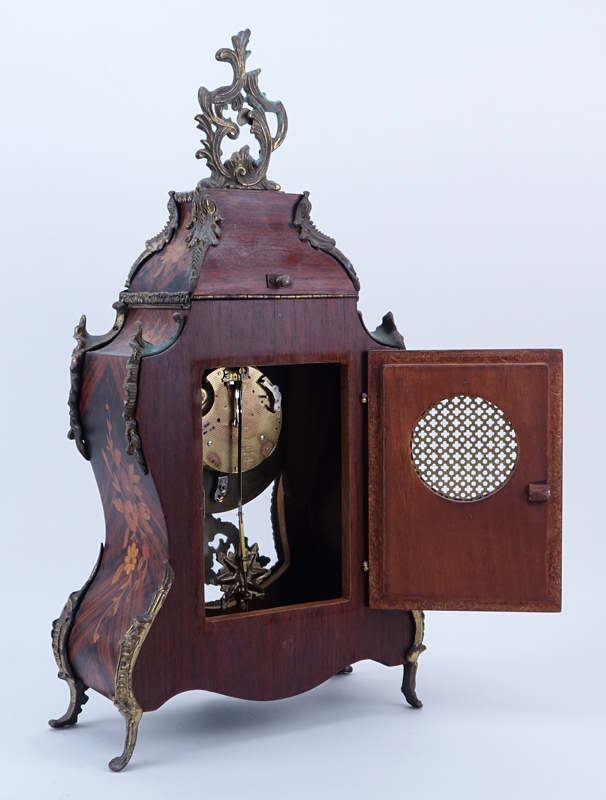 Hermle Boulle Style Inlaid Wood and Bronze Mounted  Clock with Wall Bracket. Has key and pendulum.