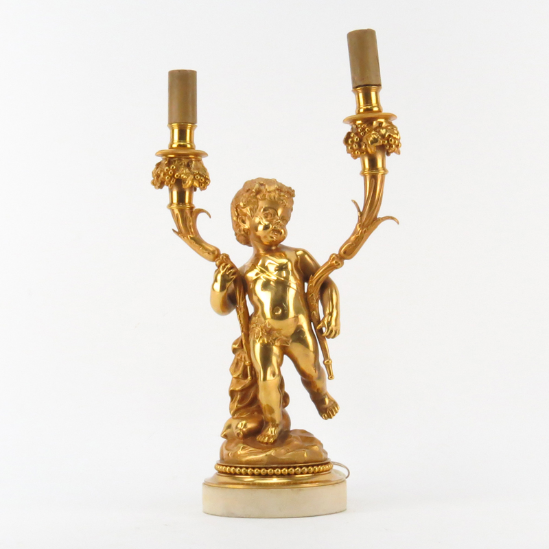 Late 19th Century Two Arm Gilt Bronze Putti Lamp on Marble Base.