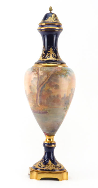 Early 20th Century Sevres Style Cobalt Blue and Gilt Porcelain Covered Urn.