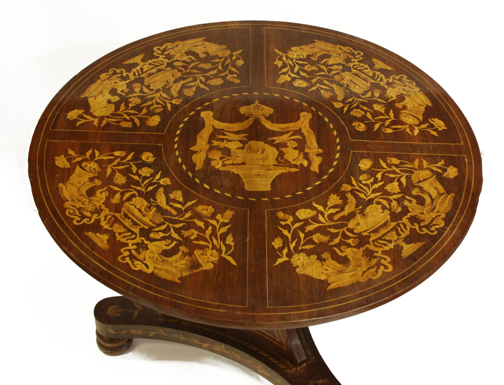 Antique Dutch Baroque Style Mixed Wood Marquetry Center Table on a tripod, footed base, the top, apron and base inlaid with elaborate design. 