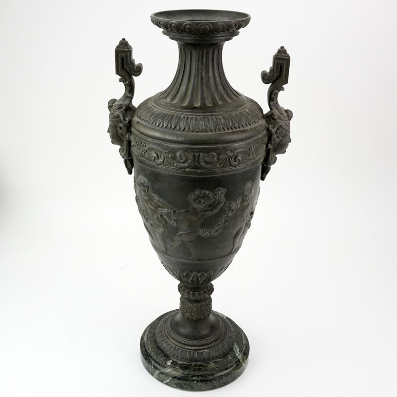 Antique Neoclassical Style Patinated White Metal Urn on Marble Base.