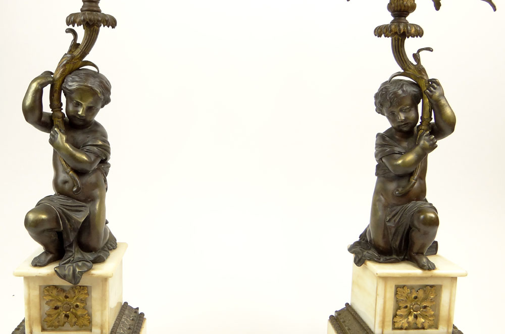 Pair of Antique French Bronze and Marble Figural Six Light Candelabra.