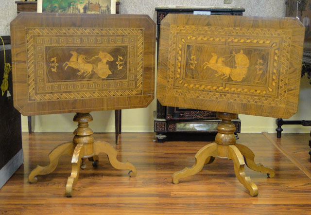 Lot of Two (2) Associated 19th Century Italian Inlaid Walnut Tilt-top Game Tables or Side Tables each with Marquetry Inlay of a Roman Charioteer and a Double Parquetry Border Comprised of Various Exotic Woods.