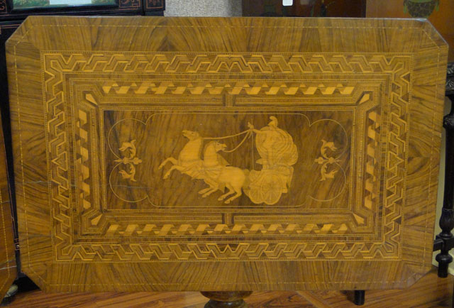 Lot of Two (2) Associated 19th Century Italian Inlaid Walnut Tilt-top Game Tables or Side Tables each with Marquetry Inlay of a Roman Charioteer and a Double Parquetry Border Comprised of Various Exotic Woods.