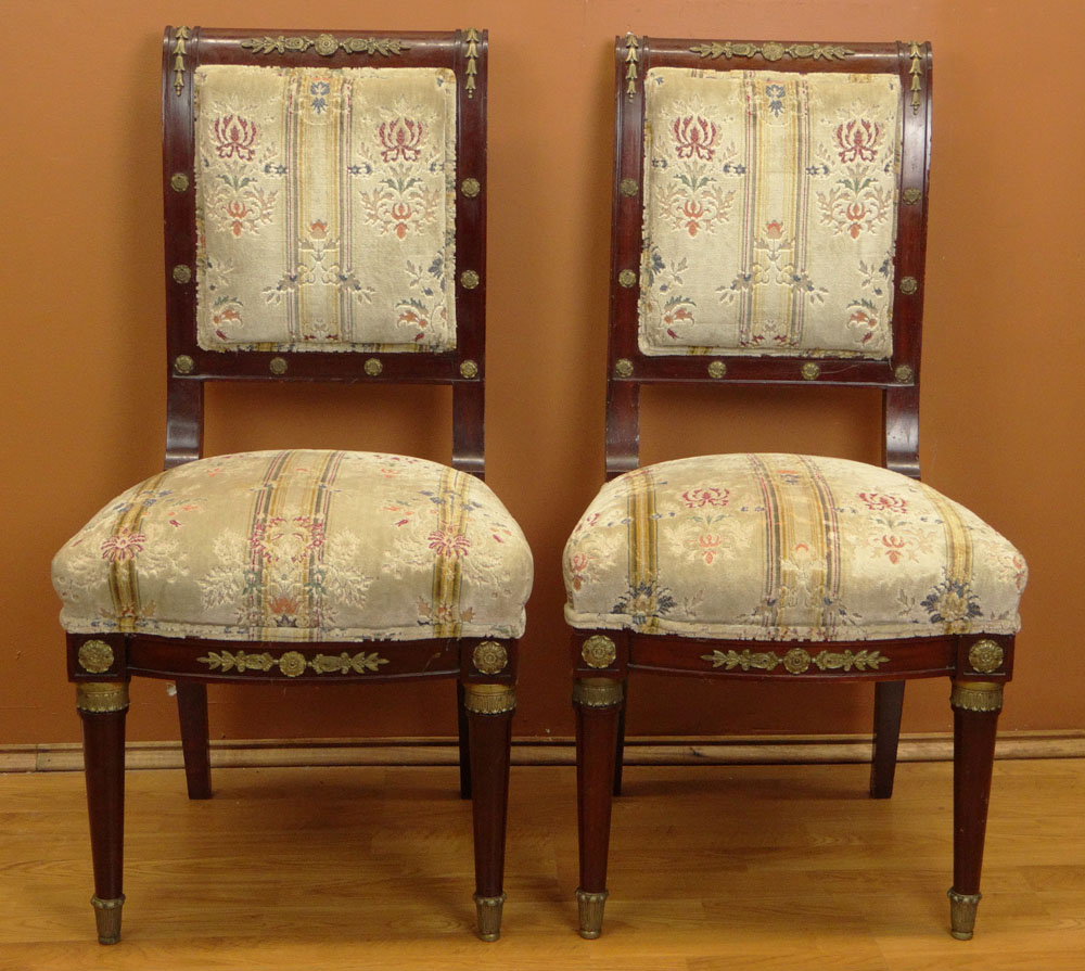 Pair of 19/20th Century French Empire style Bronze Mounted Mahogany and Upholstered Side Chairs.