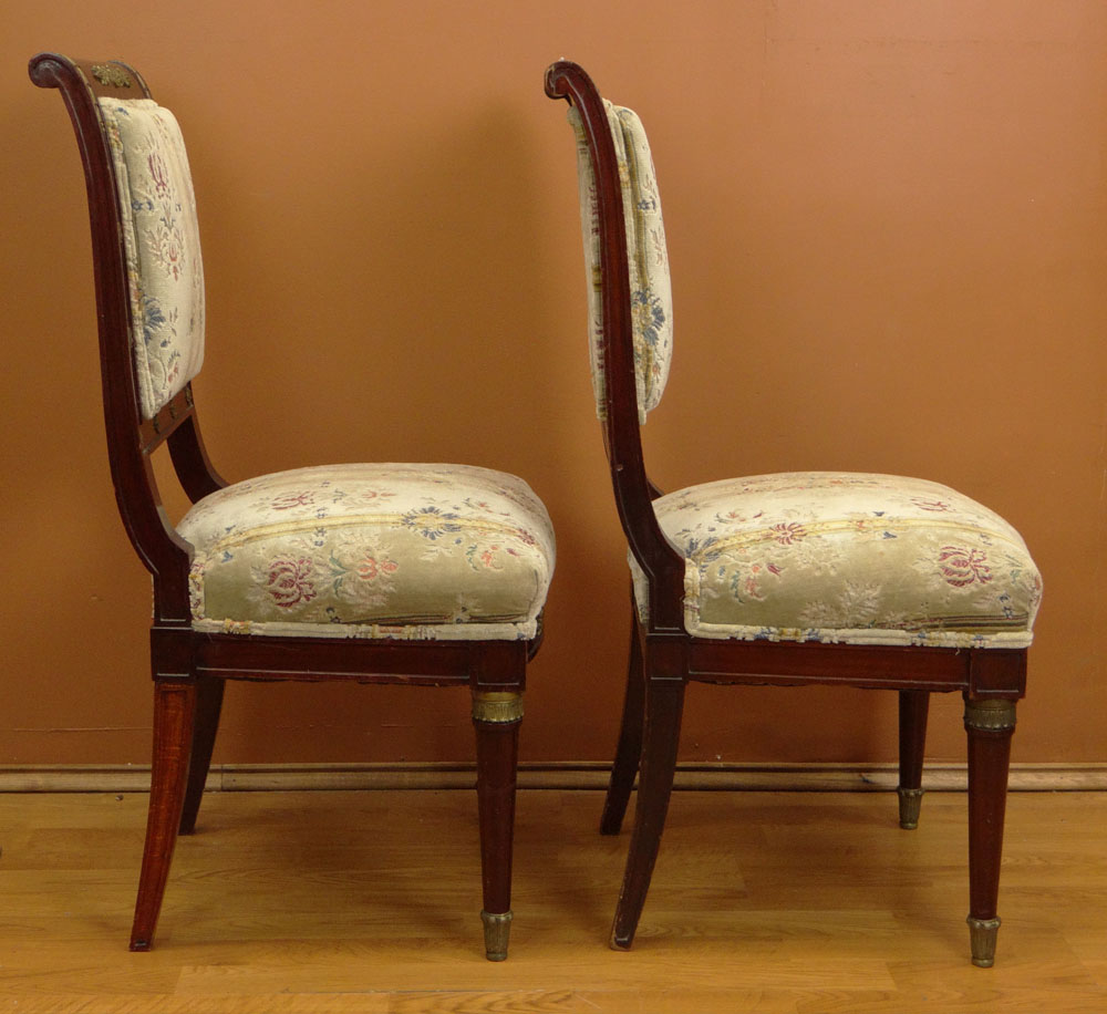 Pair of 19/20th Century French Empire style Bronze Mounted Mahogany and Upholstered Side Chairs.