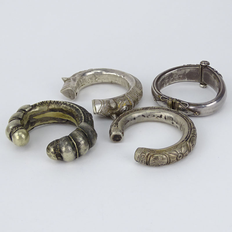 Collection of Four (4) Vintage Middle Eastern / Indian or African Silver Cuff Bangle Bracelets.