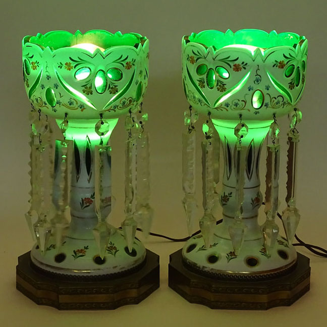 Pair of 20th Century Bohemian Glass Lusters. Electrified and with bronze bases.