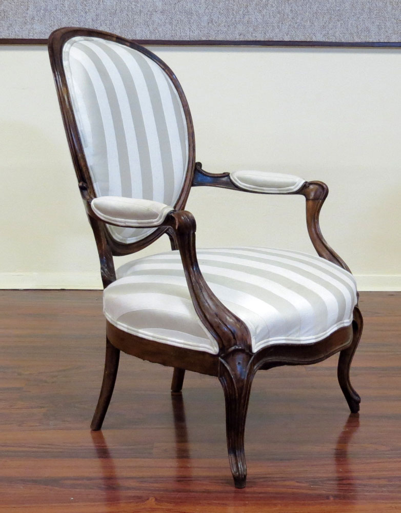 Pair of French Louis Philippe (1830-1848) Carved Beech Wood Fauteuils.