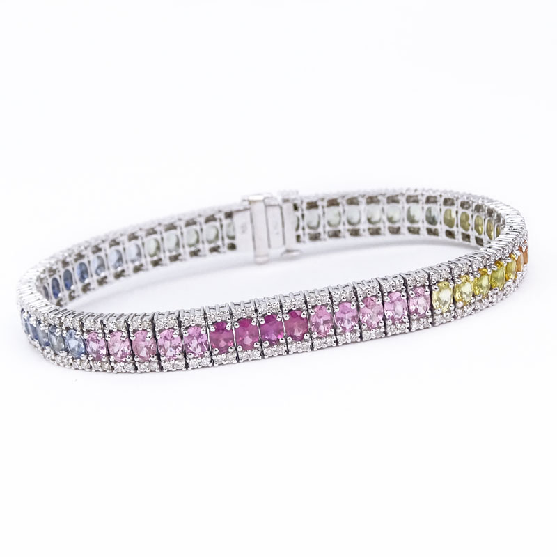 Approx. 11.50 Carat Oval Cut Multi Color Sapphire, 2.25 Carat Round Brilliant Cut Diamond and 18 Karat White Gold Bracelet. 