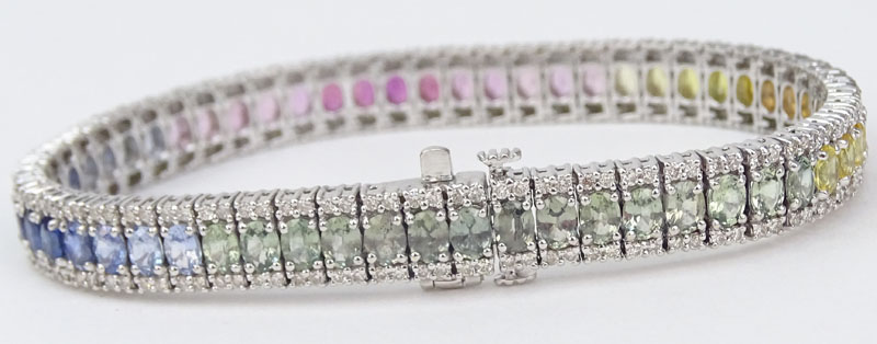 Approx. 11.50 Carat Oval Cut Multi Color Sapphire, 2.25 Carat Round Brilliant Cut Diamond and 18 Karat White Gold Bracelet. 