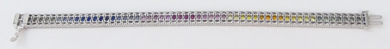 Approx. 11.50 Carat Oval Cut Multi Color Sapphire, 2.25 Carat Round Brilliant Cut Diamond and 18 Karat White Gold Bracelet. 