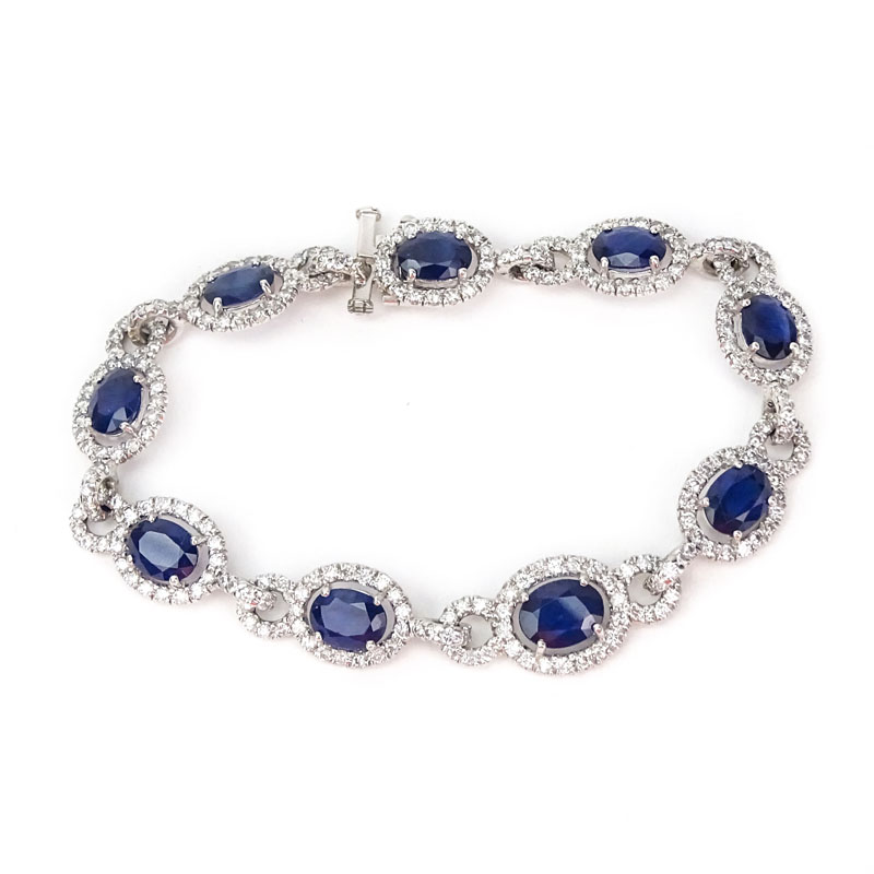 Approx. 13.57 Carat Oval Cut Sapphire, 4.64 Carat Round Brilliant Cut Diamond and 18 Karat White Gold Bracelet. 