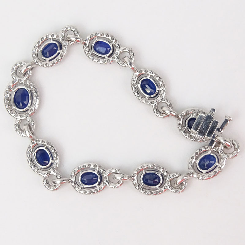 Approx. 13.57 Carat Oval Cut Sapphire, 4.64 Carat Round Brilliant Cut Diamond and 18 Karat White Gold Bracelet. 