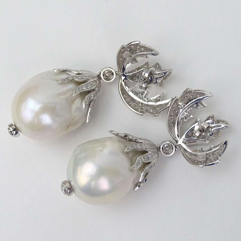 Large Baroque Pearl, Approx. 2.15 Carat Round Brilliant Cut Diamond and 18 Karat White Gold Drop Earrings.