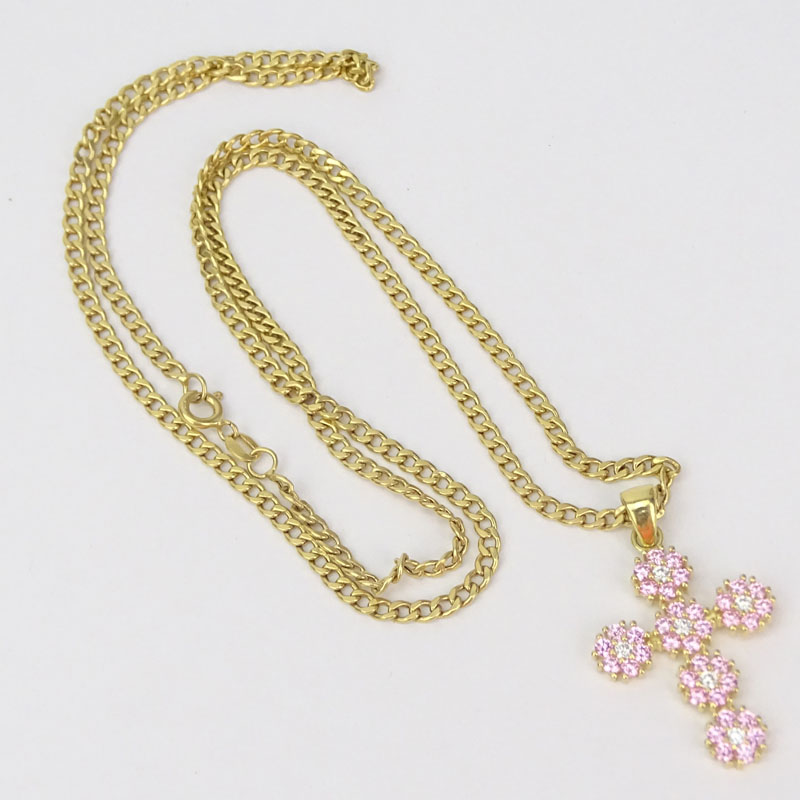 18 Karat Yellow Gold, Pink Gemstone and Diamond Cross Pendant Necklace. 