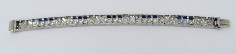 Art Deco Approx. 5.0 Carat Transition and Old European Cut Diamond, 6.50 Carat Calibre Cut Sapphire and Platinum Bracelet. 