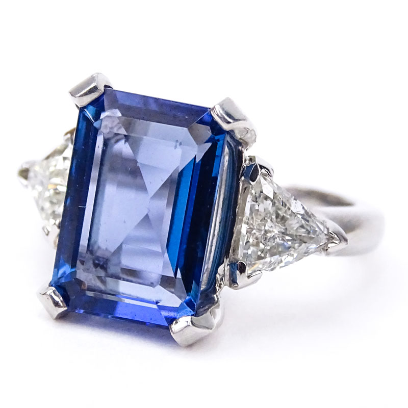 Approx. 5.50 Carat Emerald Cut Tanzanite, 1.15 Carat Trillion Cut Diamond and Platinum Engagement Ring. 
