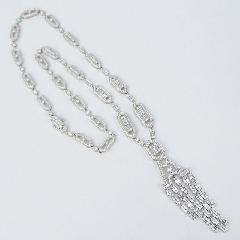 Art Deco style Approx. 10.0 Carat Round Brilliant and Baguette Cut Diamond and 18 Karat White Gold Pendant Necklace.