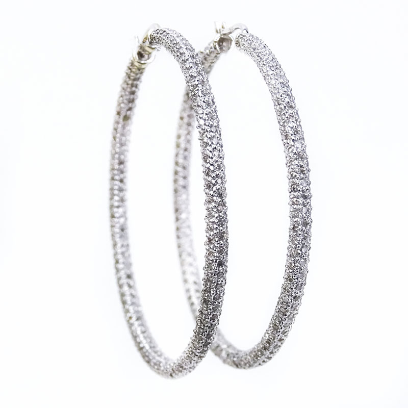 Approx. 6.34 Carat Micro Pave Set Round Brilliant Cut Diamond and 14 Karat White Gold Hoop Earrings.