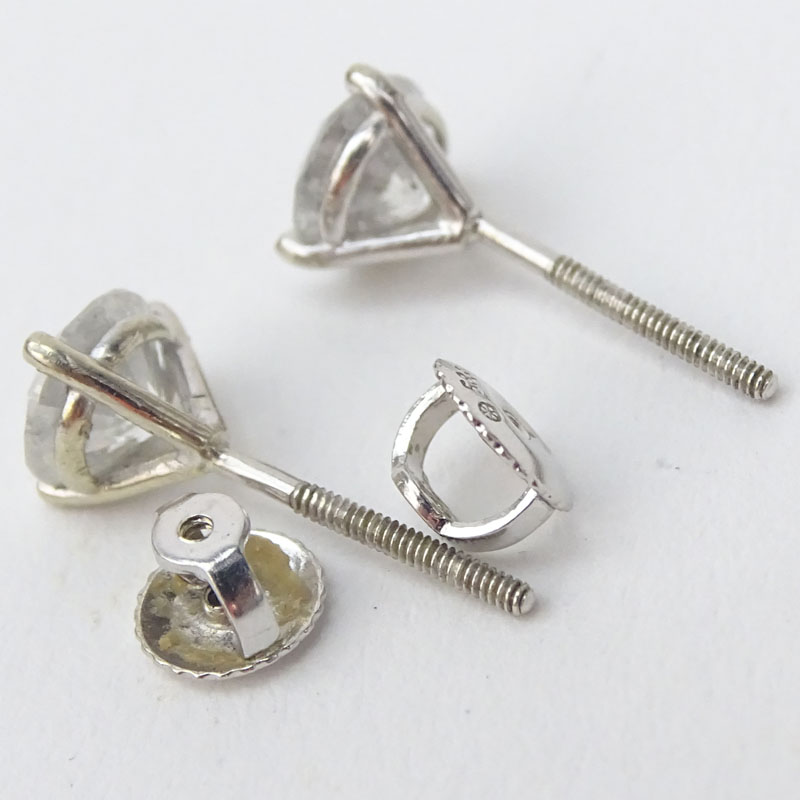 Vintage Approx. 1.80 Carat TW Round Brilliant Cut Diamond and 14 Karat White Gold Ear Studs.