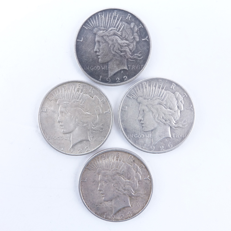 Collection of Four (4) U.S. Peace Dollars.