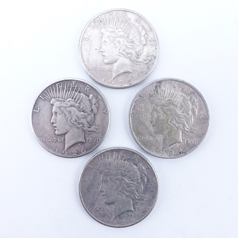 Collection of Four (4) U.S. Peace Dollars.