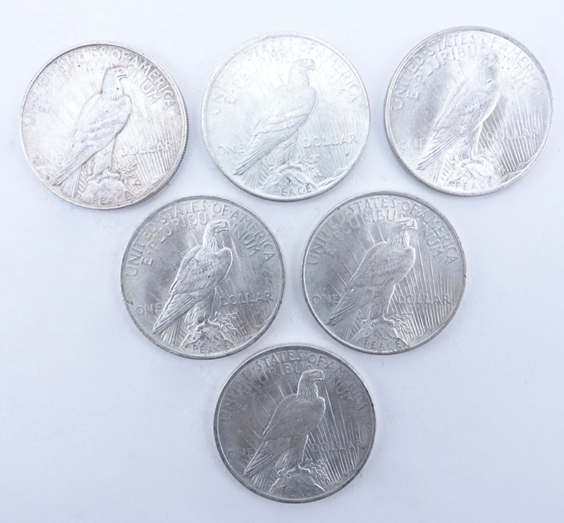 Collection of Six (6) U.S. Peace Silver Dollars.