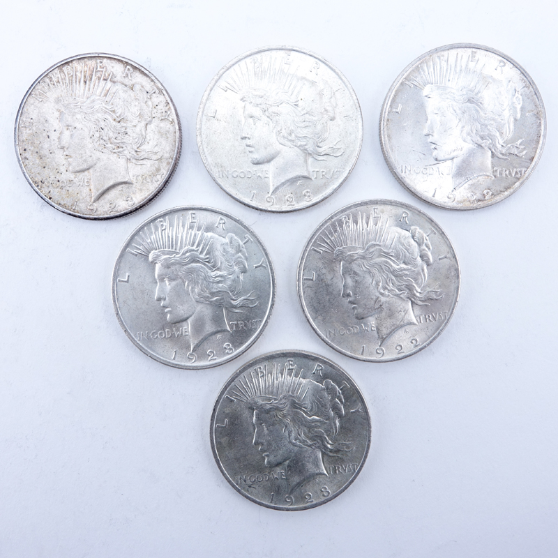 Collection of Six (6) U.S. Peace Silver Dollars.