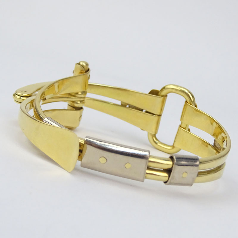 Amitai Kav, Israeli Circa 1995 Heavy 18 Karat Yellow and White Gold Modern Design Folding Horse Bit style Bracelet.