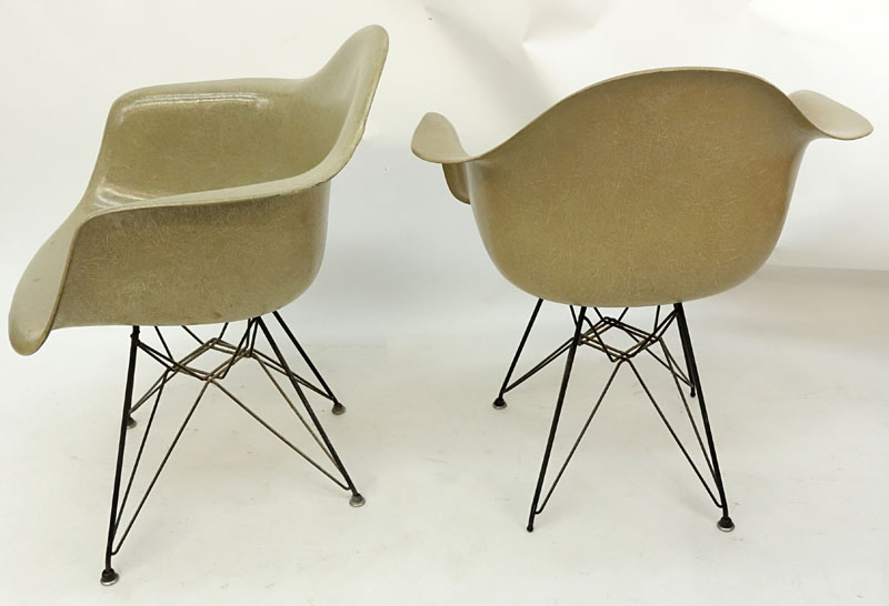 Pair of Eames for Herman Miller Molded Fiberglass Arm Chairs on Eiffel Tower Bases.