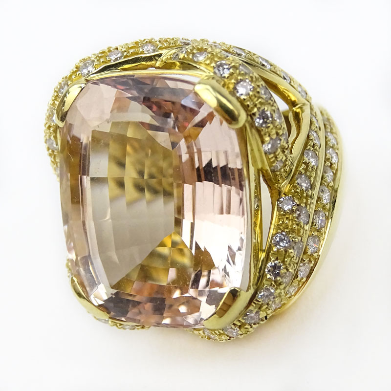 Lady's Approx. 30.0 Carat Gem Quality Cushion Cut Kunzite, 2.50 Carat Round Cut Diamond and 18 Karat Yellow Gold Ring. 