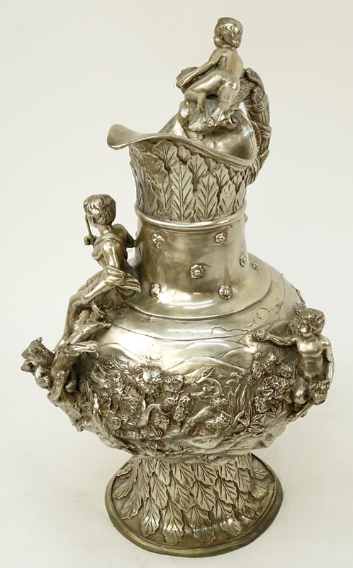 Modern Silvered Bronze Ewer with Raised Relief.