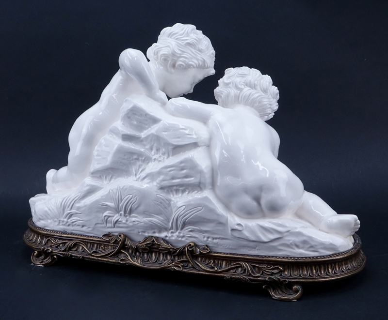 Large Modern White Pottery Putti Group Mounted on Bronze Base.