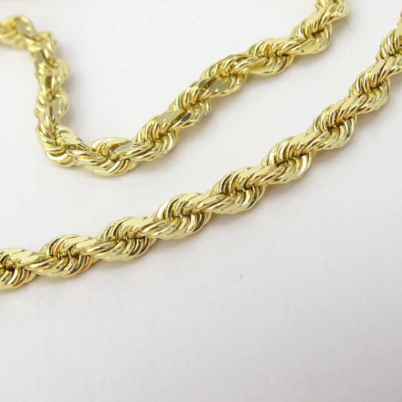 Man's Vintage 14 Karat Yellow Gold Diamond Cut Rope Chain Necklace.