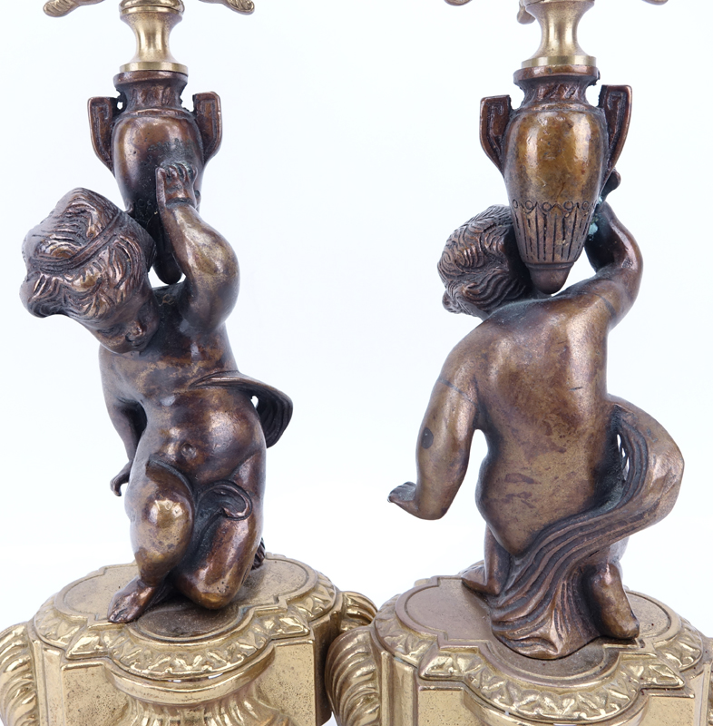 Two Antique style Italian Bronze Figural Candelabra.