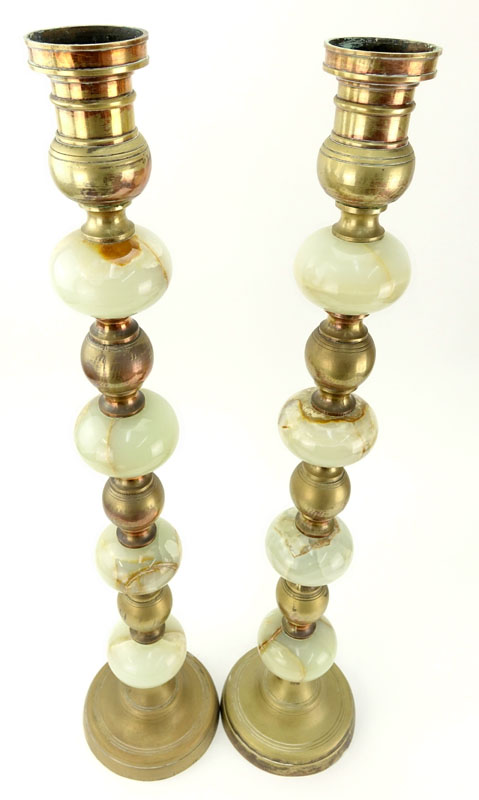 Pair of Tall Mid Century Brass and Onyx Candlesticks.