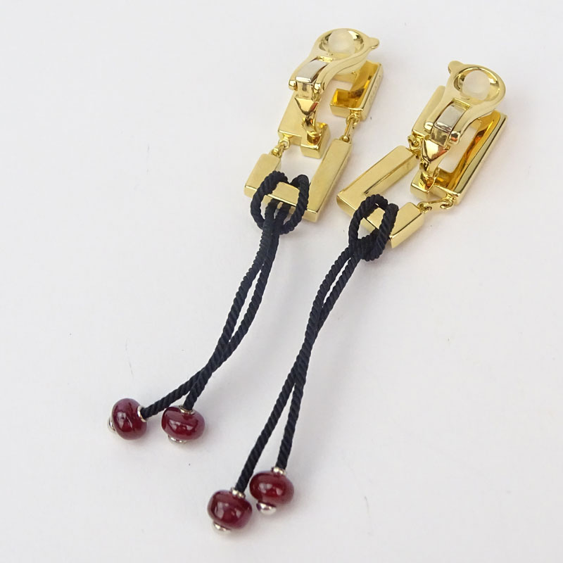 Cartier 18 Karat Yellow Gold and Approx. 3.0 Carat Ruby Bead Dangle Ear Clips.