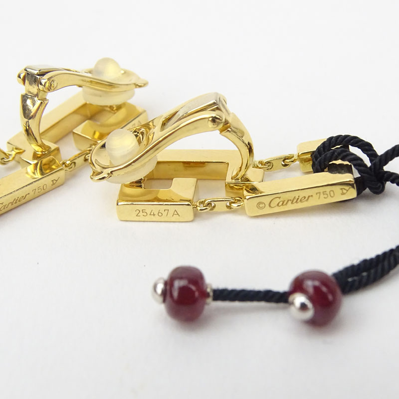 Cartier 18 Karat Yellow Gold and Approx. 3.0 Carat Ruby Bead Dangle Ear Clips.