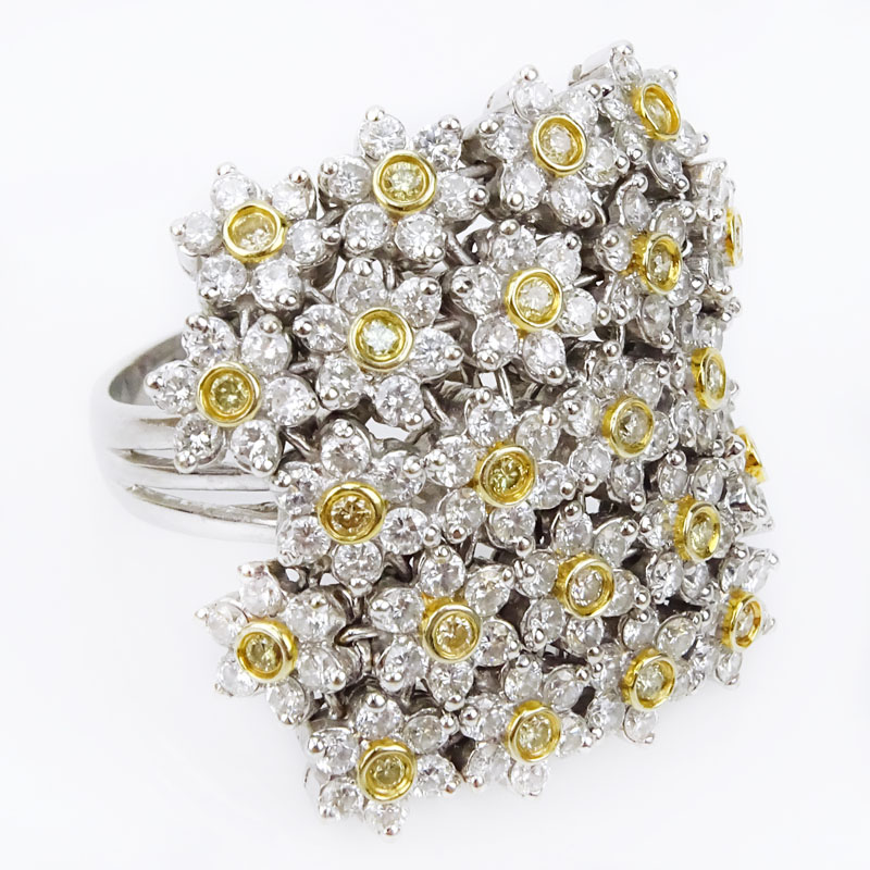 Approx. 3.52 Carat Round Brilliant Cut Diamond, .45 Carat Fancy Yellow Diamond and 18 Karat Yellow and White Gold Ring. 