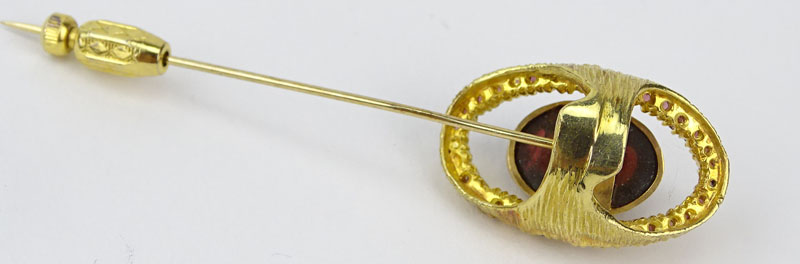 Vintage Garnet and 14 Karat Yellow Gold Stick Pin Set in the Center with an Oval  Cabochon Cut Garnet Measuring 13mm x 9mm. Unsigned.