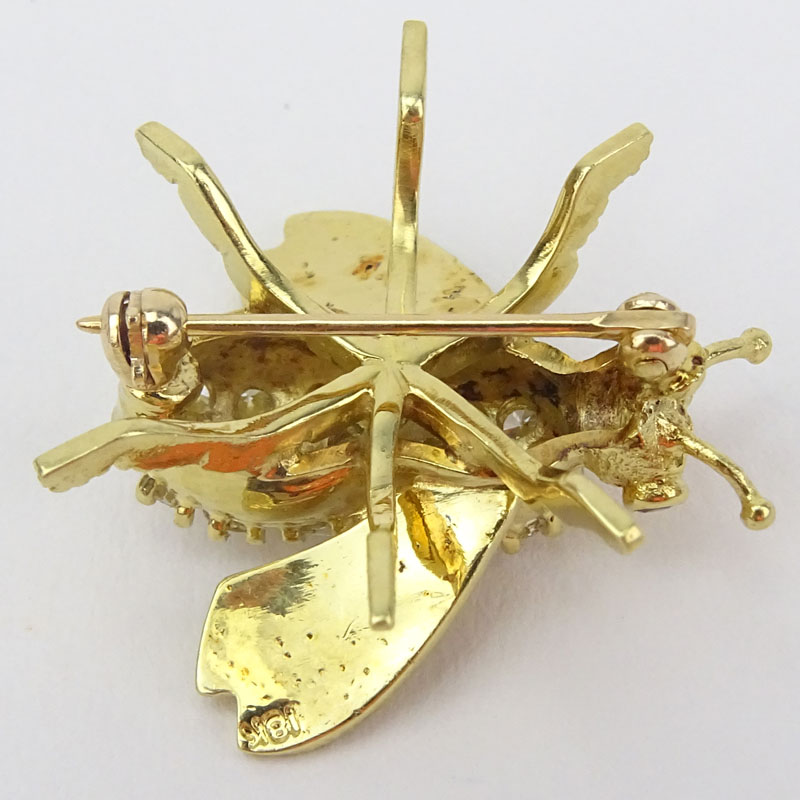 Vintage Approx. 1.0 Carat Round Brilliant Cut Diamond and 18 Karat Yellow Gold Bee Brooch accented with Ruby Eyes.