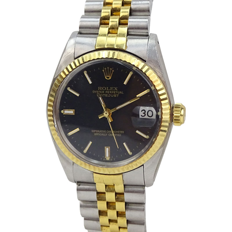 Vintage Rolex Datejust 18K Yellow Gold and Stainless Steel Jubilee Black Dial Watch, 31mm Case. Good vintage condition.