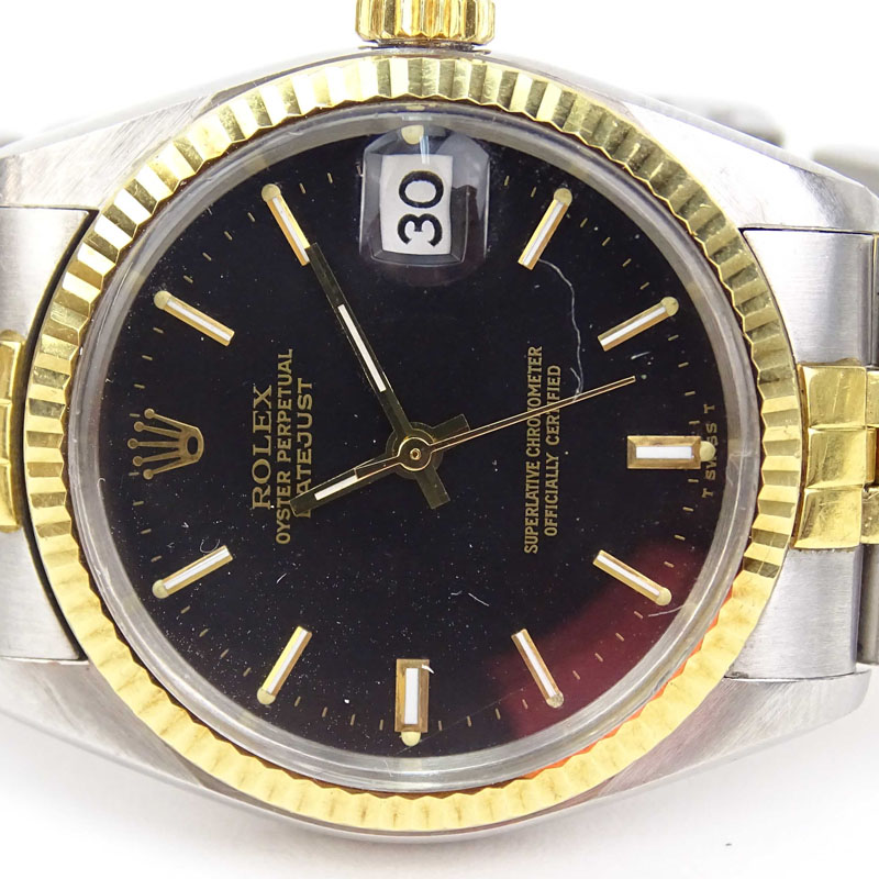 Vintage Rolex Datejust 18K Yellow Gold and Stainless Steel Jubilee Black Dial Watch, 31mm Case. Good vintage condition.