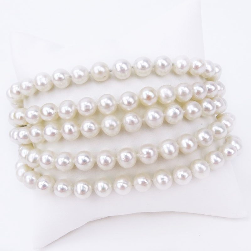 Approx. 1.35 Carat Diamond. Pearl and 18 Karat White Gold Five Strand Bracelet.