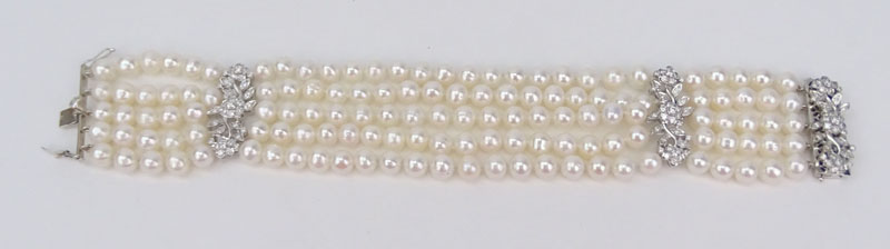 Approx. 1.35 Carat Diamond. Pearl and 18 Karat White Gold Five Strand Bracelet.