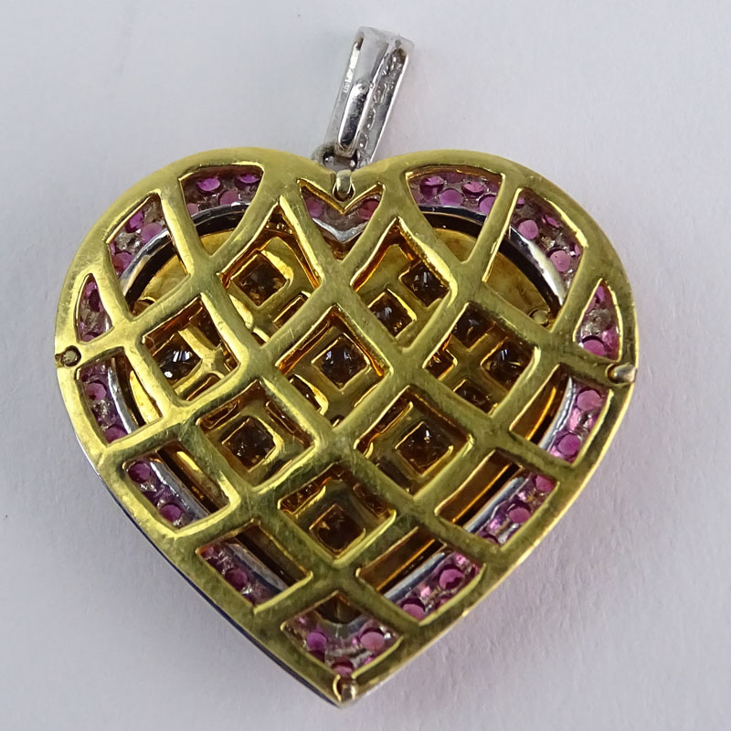 Approx. 3.10 Carat Princess Cut Diamond, 1.54 Carat Pave Set Pink Sapphire and 18 Karat Yellow and White Gold Heart Pendant. 