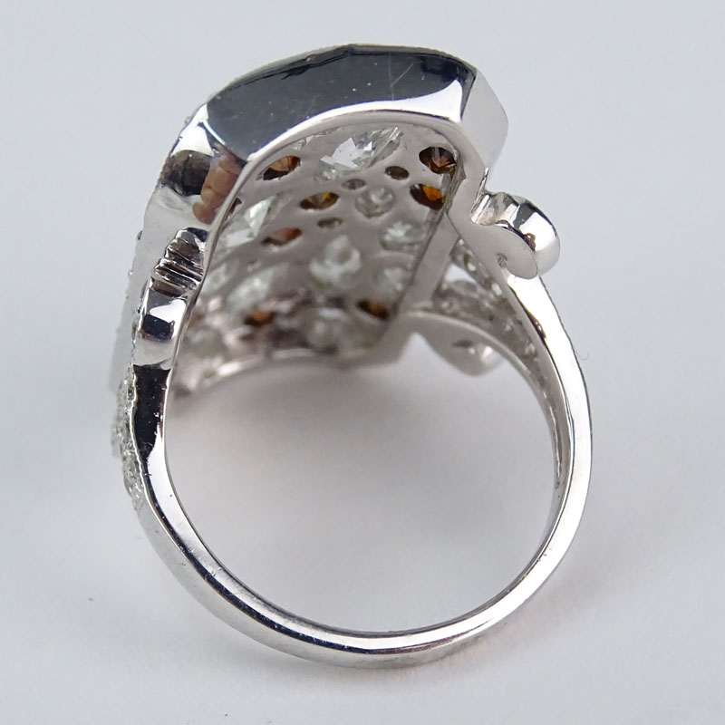 Approx. 3.97 Carat Diamond, 1.73 Carat Brown Diamond and 18 Karat White Gold Ring. 