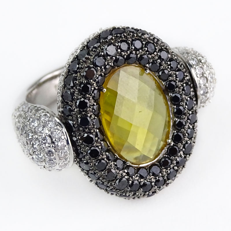 Approx. 4.44 Carat Pave Set Diamond, 3.39 Carat Pave Set Round Black Diamond, 8.46 Carat Oval Cut Citrine and 18 Karat White Gold Reversible Ring. 