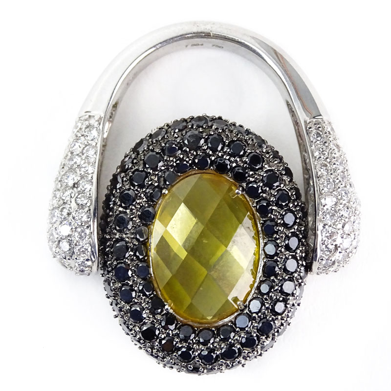 Approx. 4.44 Carat Pave Set Diamond, 3.39 Carat Pave Set Round Black Diamond, 8.46 Carat Oval Cut Citrine and 18 Karat White Gold Reversible Ring. 